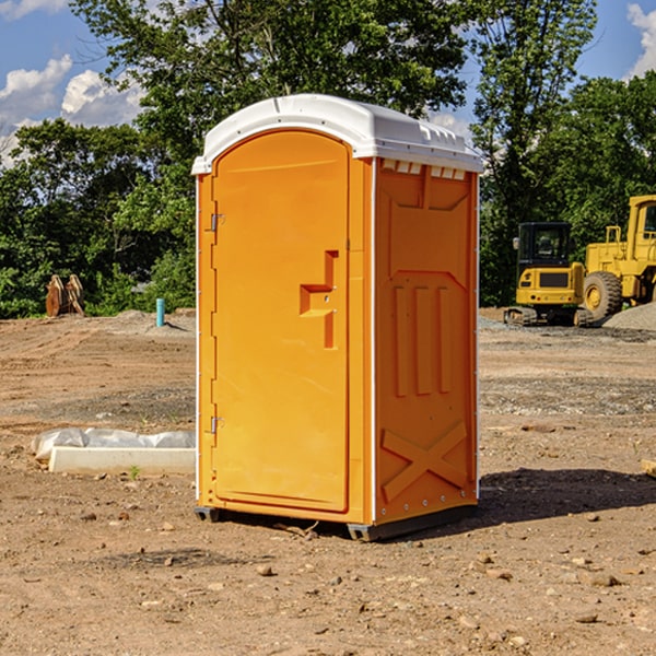 what is the cost difference between standard and deluxe portable restroom rentals in Bentonville Arkansas